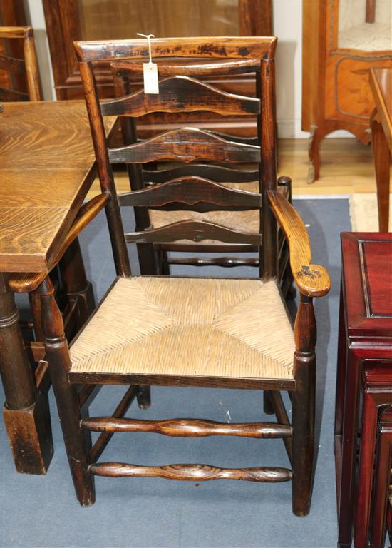 Five ladder back chairs and a carver